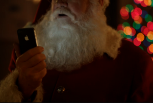 Kerstman met zijn iPhone